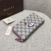 Gucci zip around wallet with embroidered face 431392 pink