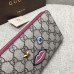 Gucci zip around wallet with embroidered face 431392 red