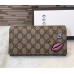 Gucci continental wallet with embroidered face 431394