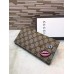 Gucci continental wallet with embroidered face 431394