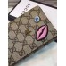 Gucci continental wallet with embroidered face 431394