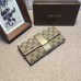 Gucci engraved gucci metal plate continental wallet 233028