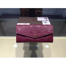 Louis Vuitton Monogram Empreinte Sarah Wallet Fuchsia