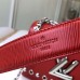 Louis Vuitton Studs And Eyelets Epi Leather Twist PM Bag Coquelicot 2018