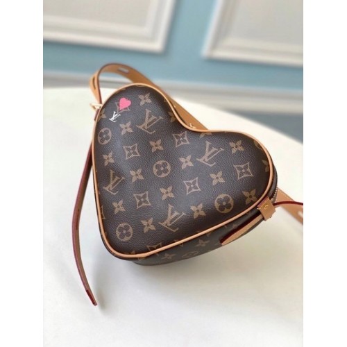 The gate ftw 🙌 This Louis Vuitton Coeur Heart Bag is roomier than it , Louis  Vuitton Bag
