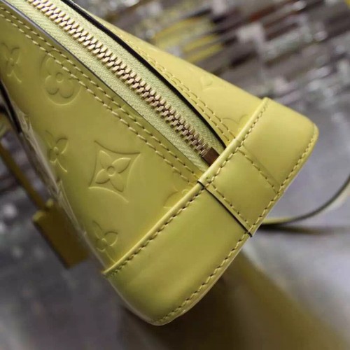 louis vuitton alma yellow